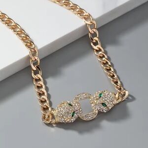 Anthropologie Gold Panther Necklace with Green Accents